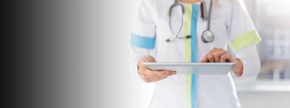 Medical professional using iPad with PhysiKey